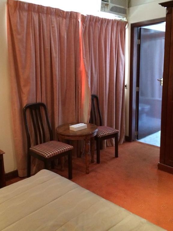 City Center Hotel Manama Quarto foto
