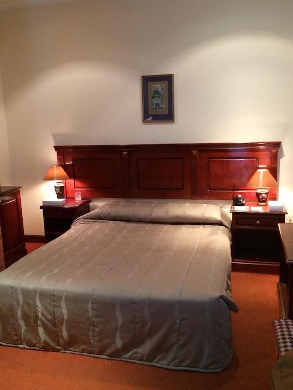 City Center Hotel Manama Quarto foto