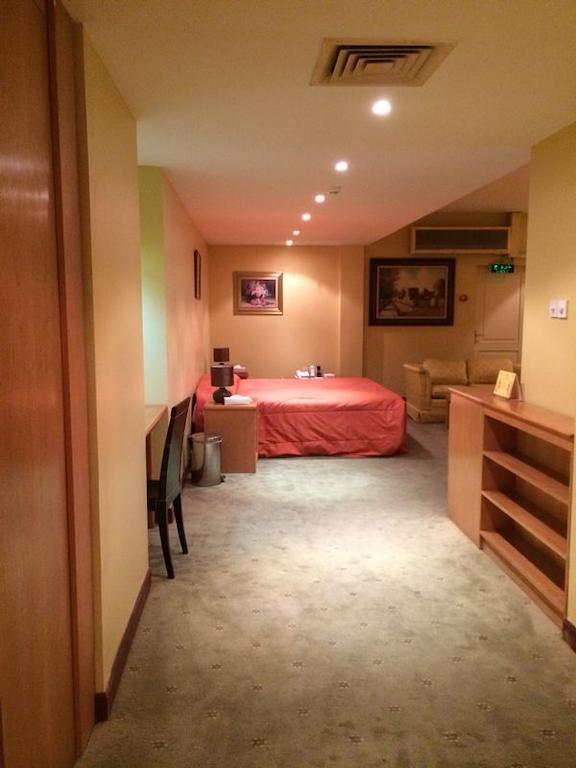 City Center Hotel Manama Quarto foto