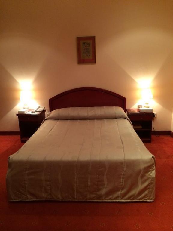 City Center Hotel Manama Quarto foto